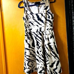 Cream, Black and Tan skater dress with pockets.